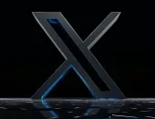 3D metallic X logo on dark background